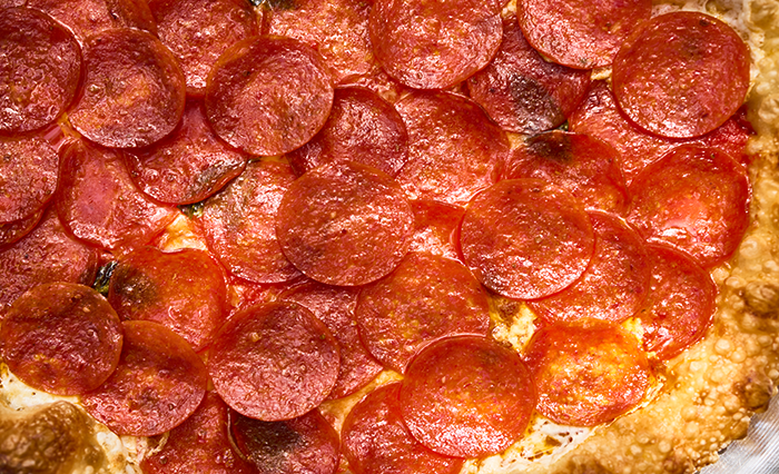 Close up Hormel Performance Pepperoni Traditional Pepperoni Pizza Round